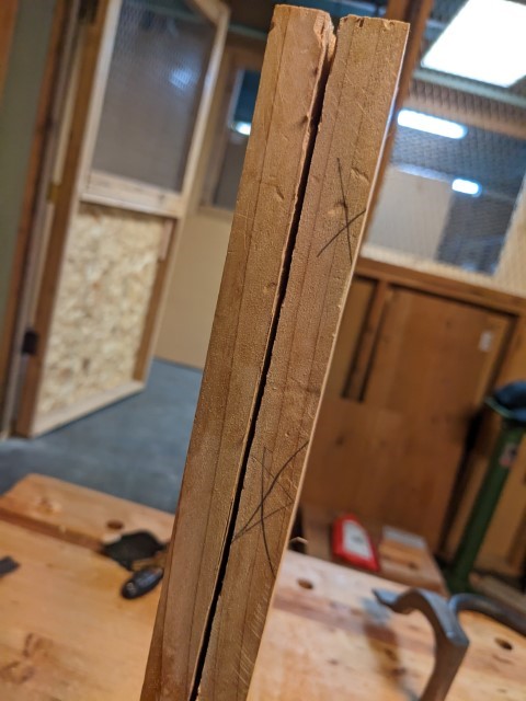 Two halves of a board, resawn vertically, clamped in my leg vise.